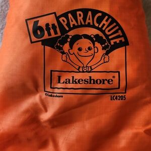 The Lakeshore 6 Foot Parachute in preschool rainbow colors is a sturdy